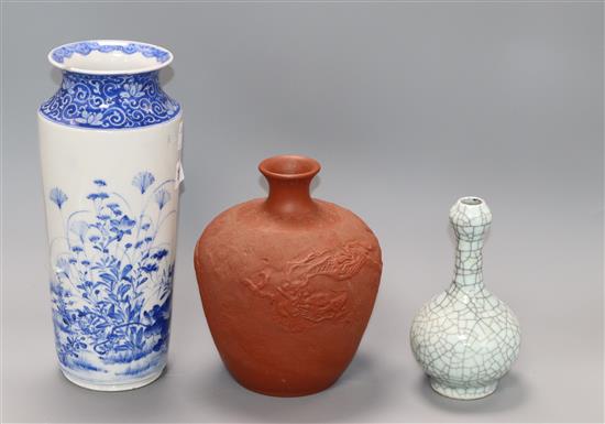 A Chinese crackleglaze vase, blue and white vase and a redware vase tallest 27cm